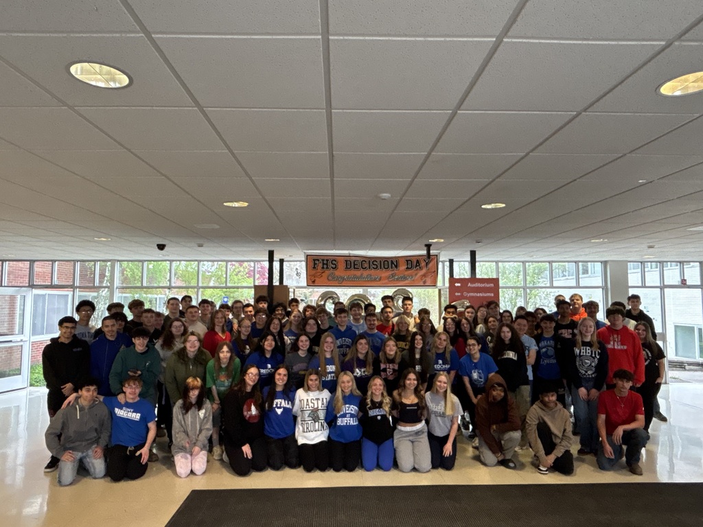 HS Seniors gathered in the foyer for a photo for Decision Day.