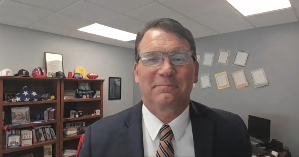 Screenshot of Dr. ZIlliox in his office.