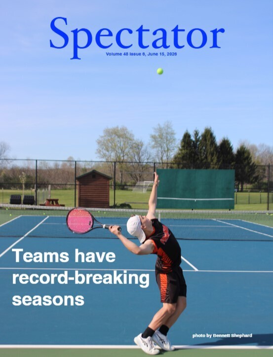 Boys Tennis player serving the ball.