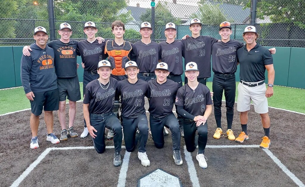 Fredonia 17U pose at home plates after winning the championship game of the South Buffalo Auxiliary League.