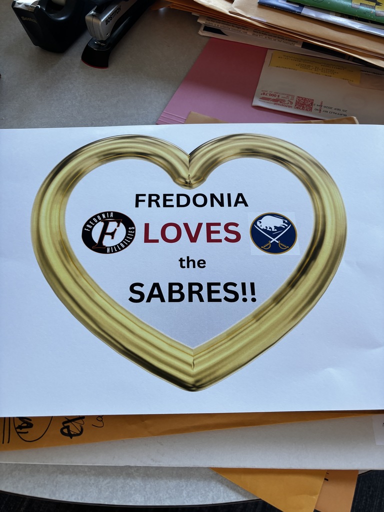 Gold heart with "Fredonia Loves the Sabres" written inside.