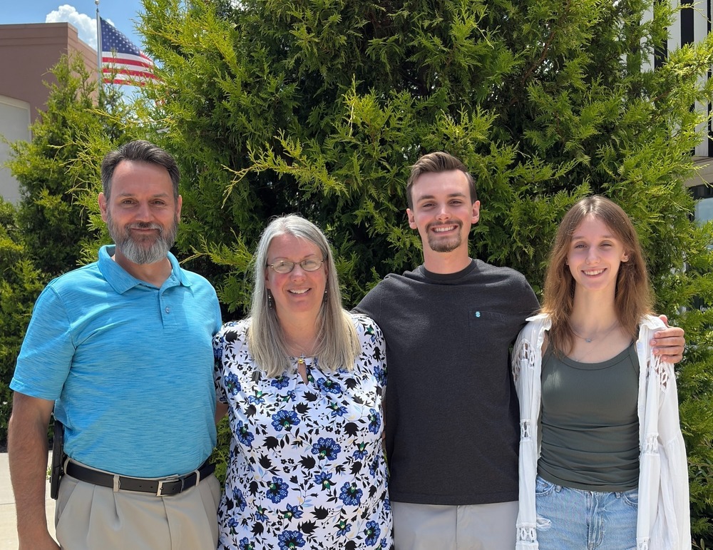 Family poses for picture