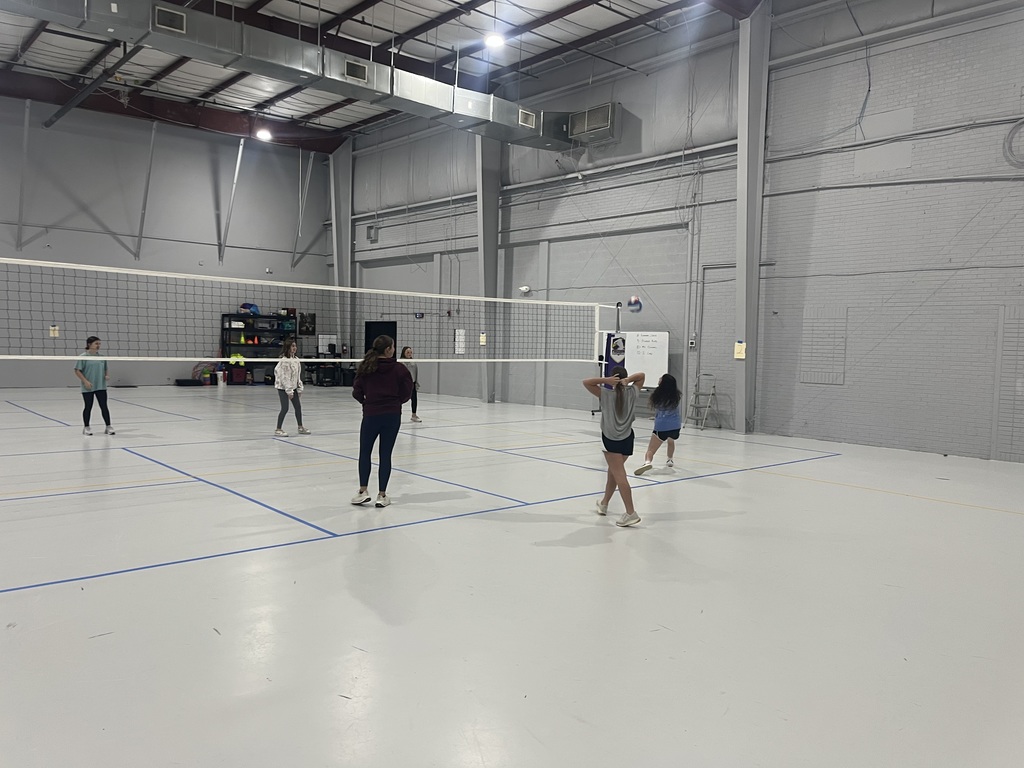 more students playing volleyball