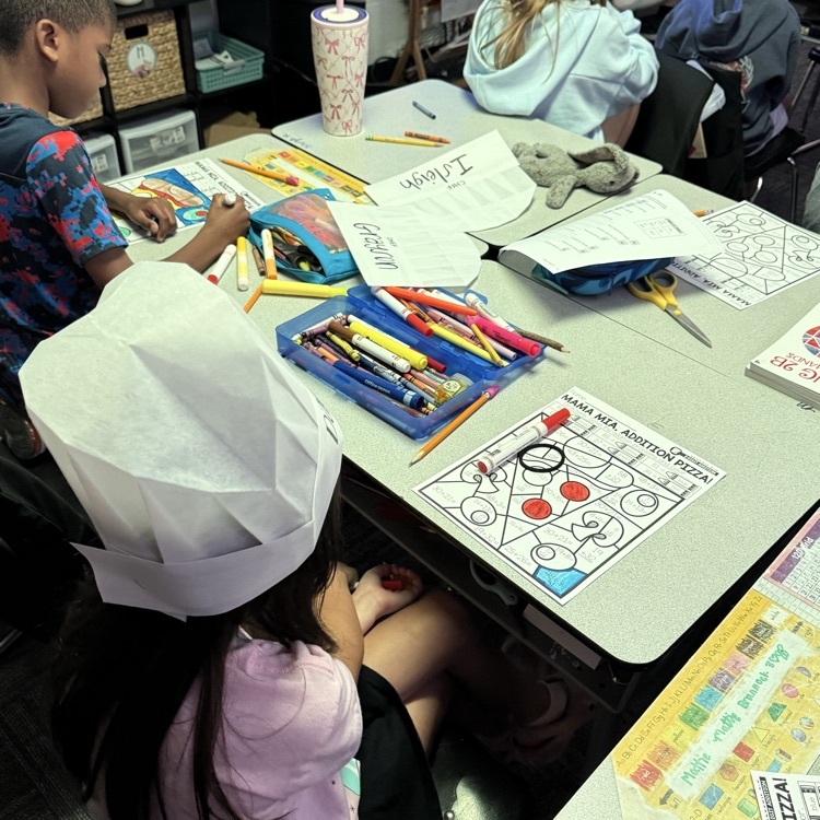 students completing a math activity