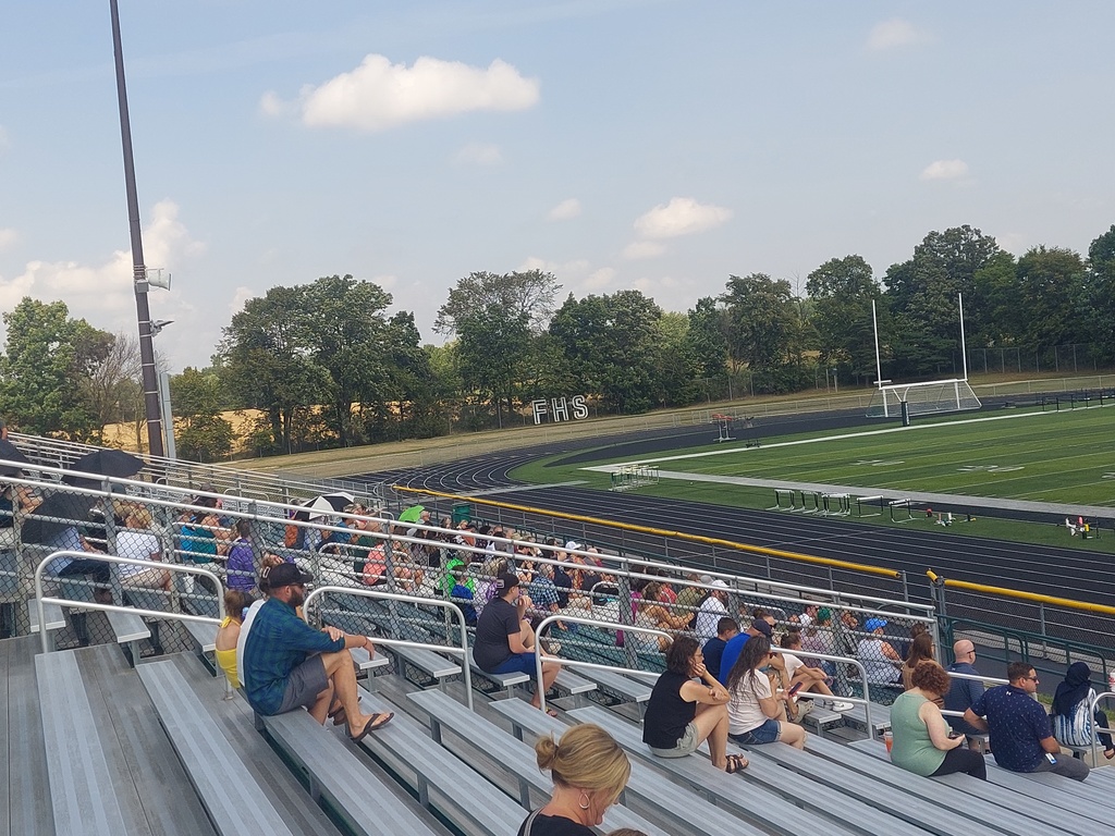 The crowd cheering on our marching band!