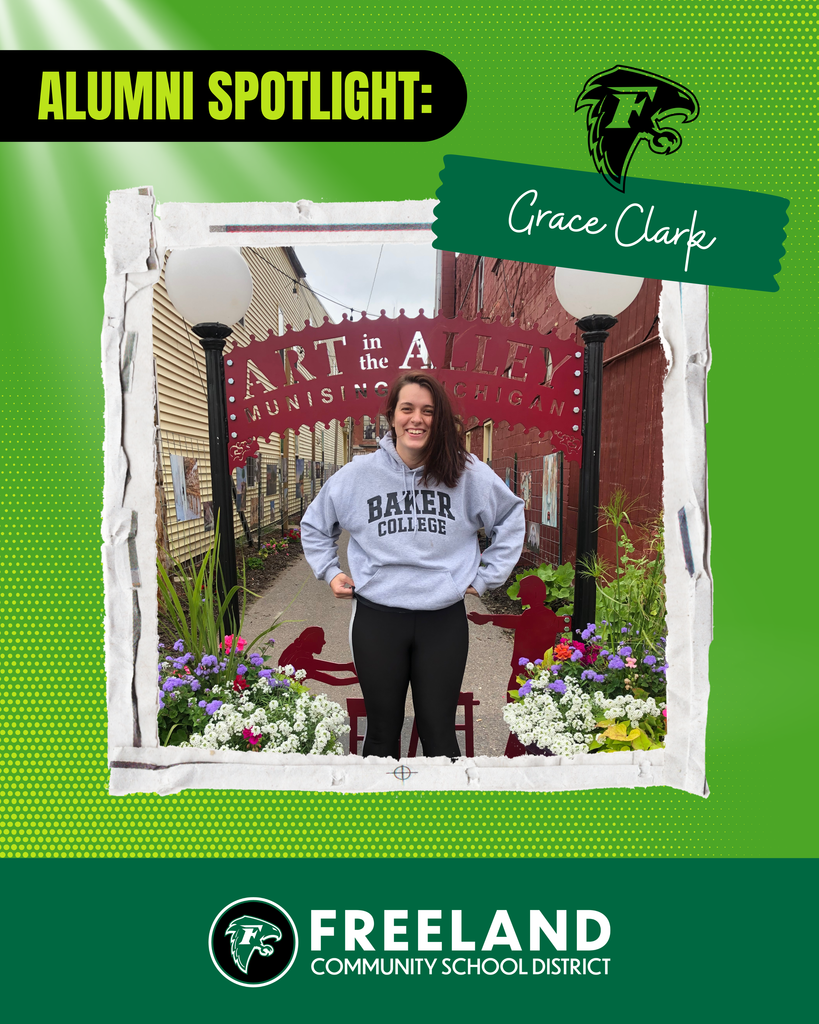 Alumni Spotlight- Grace Clark. Freeland Community School District. Photo of Grace in graden in front of Art in the Alley sign wearing grey baker college sweatshirt.