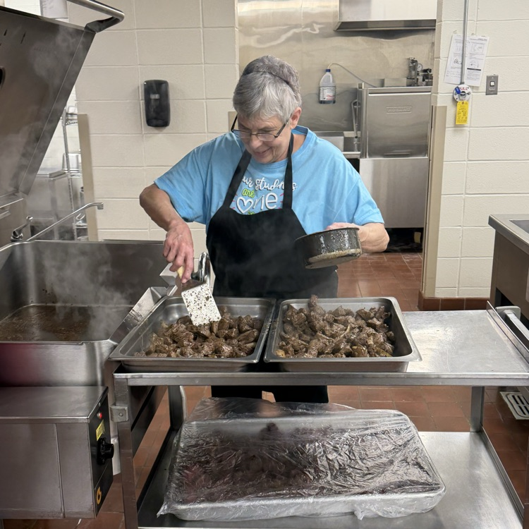 Peggy prepping steak tips