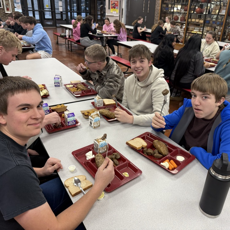 HS Boys eating steak
