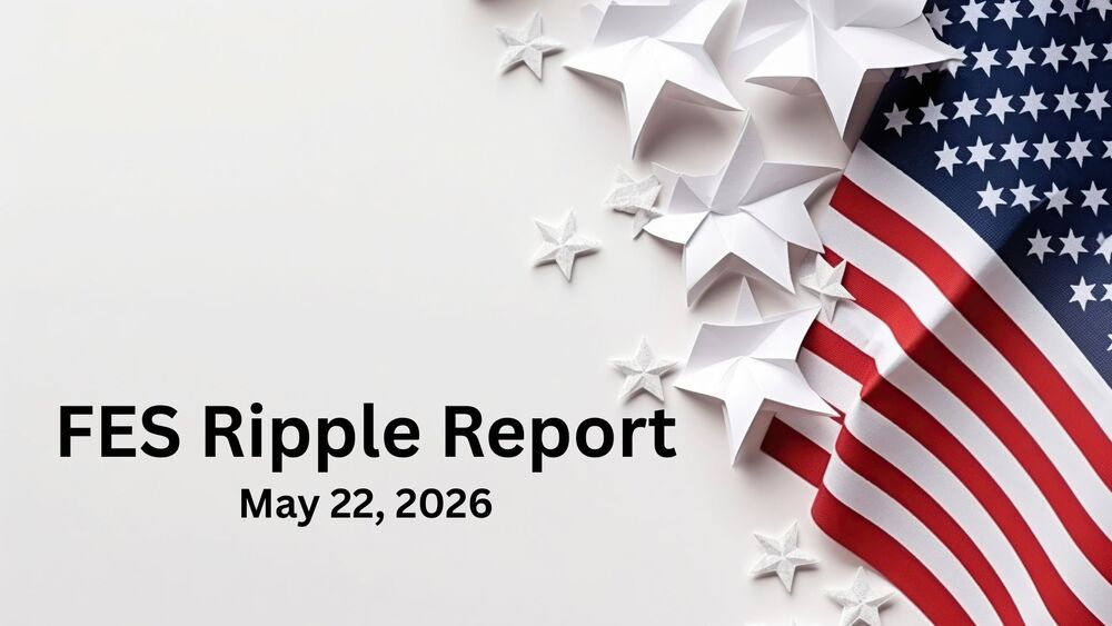 An American flag and white paper stars.