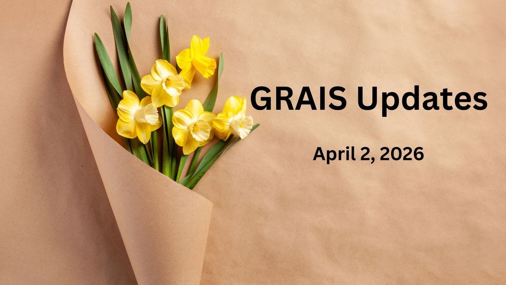 Five yellow dandelions wrapped in brown paper.