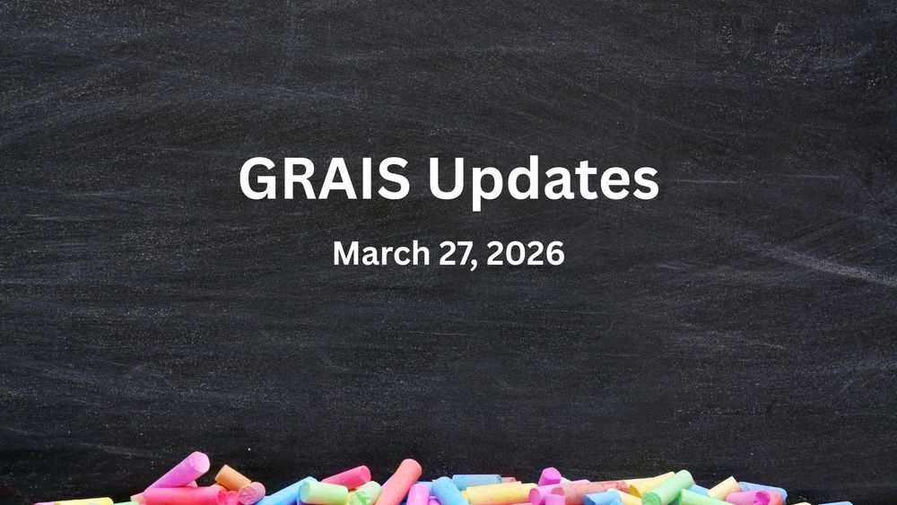 Colorful chalk pieces against a chalkboard.