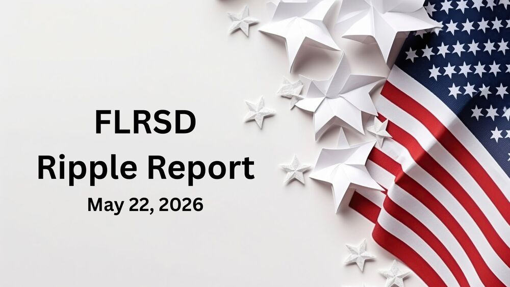 An American flag and white paper stars.
