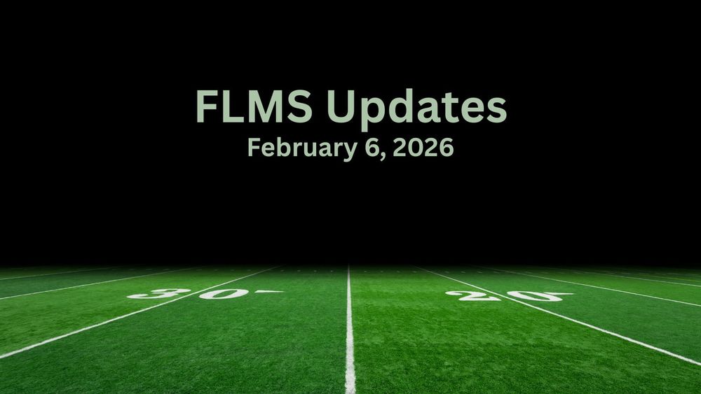 A football field at the 25 yard mark.