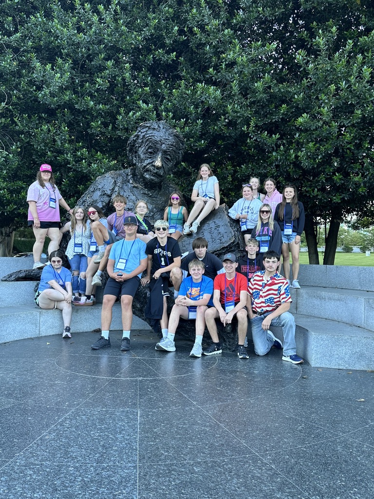 Students posing with Albert Einstein monument