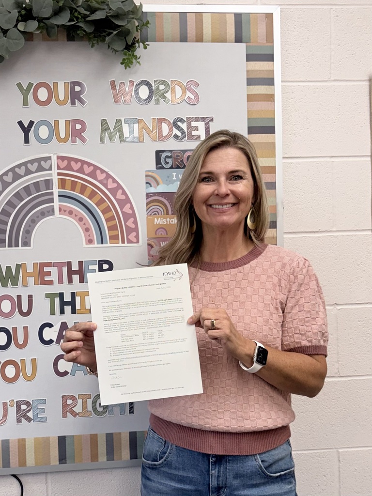 Kristy with PQI Award Letter