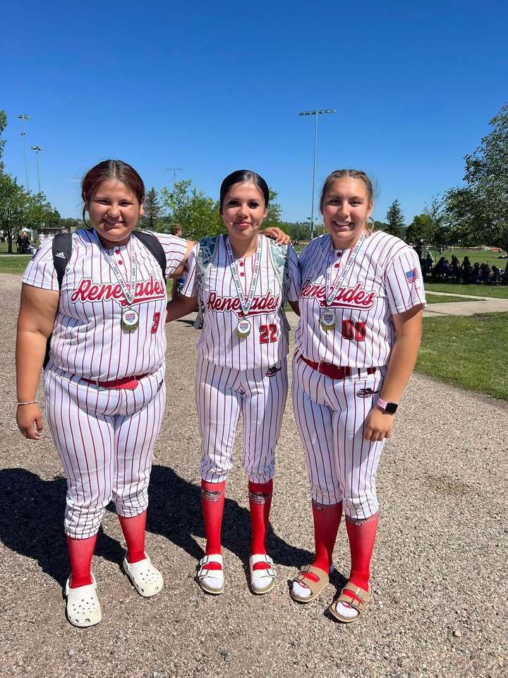 Lady Cougars playing Softball in the Summer