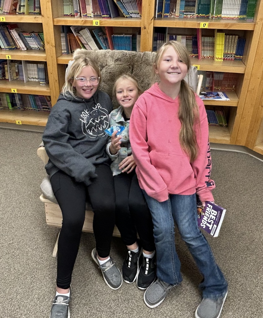 Elementary girls with deer hide