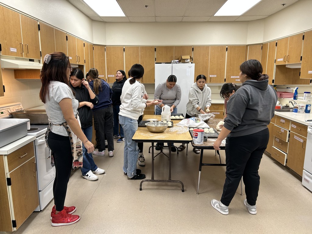JOM/IEC and Multicultural Club making fry bread