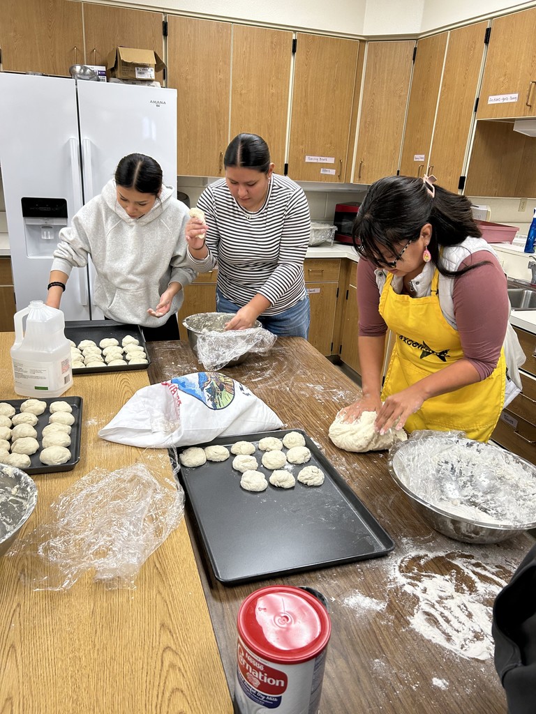 Natiya, Mila, and Chivonne making fry bread