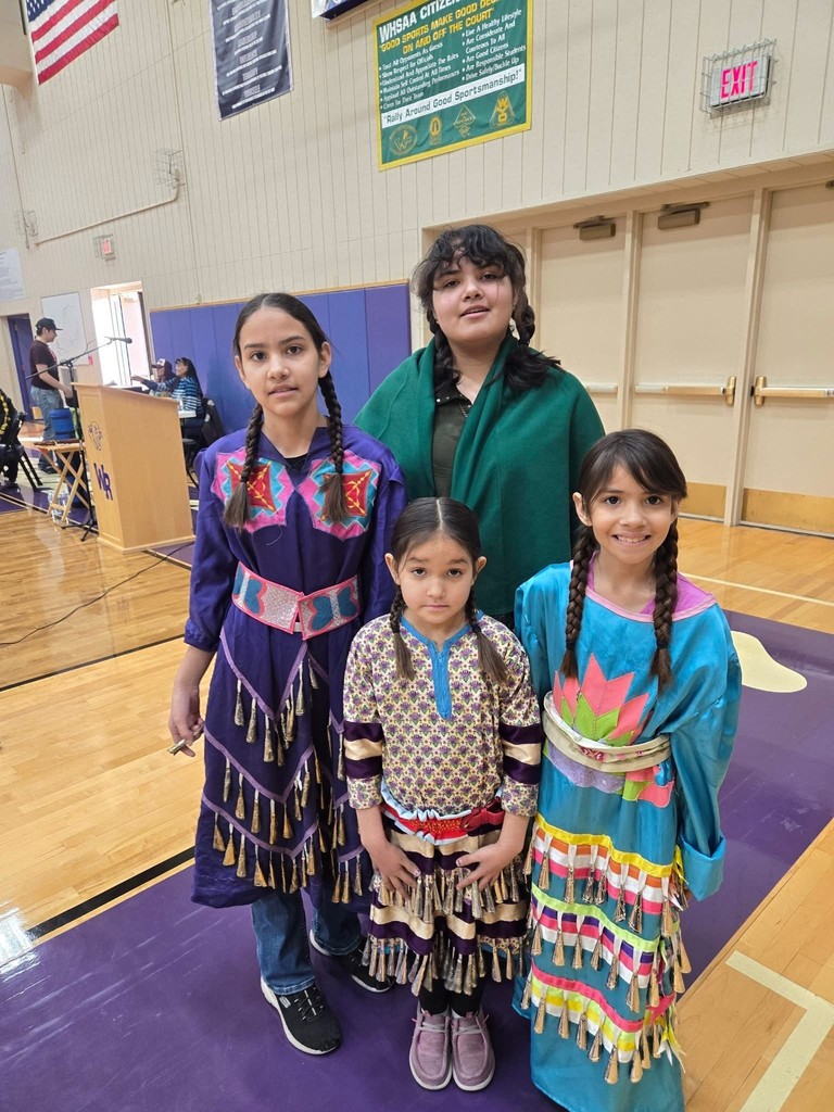 Torrez sisters in regalia