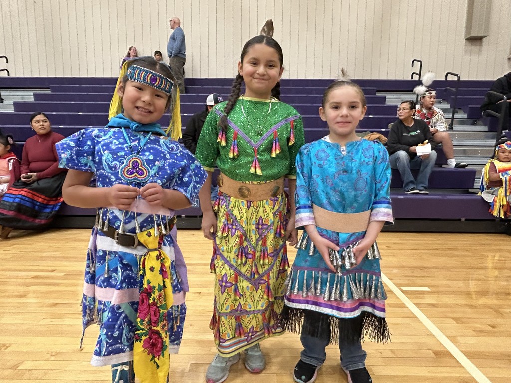 Lakota, Samiah, and Esme in regalia