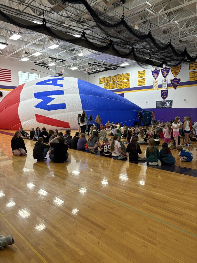 Students at hot air balloon presentation