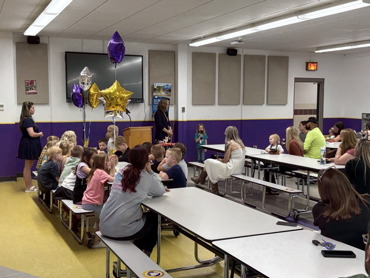 student getting recognized 