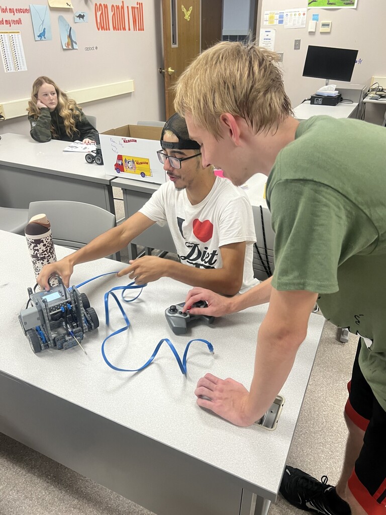 Students working with robots