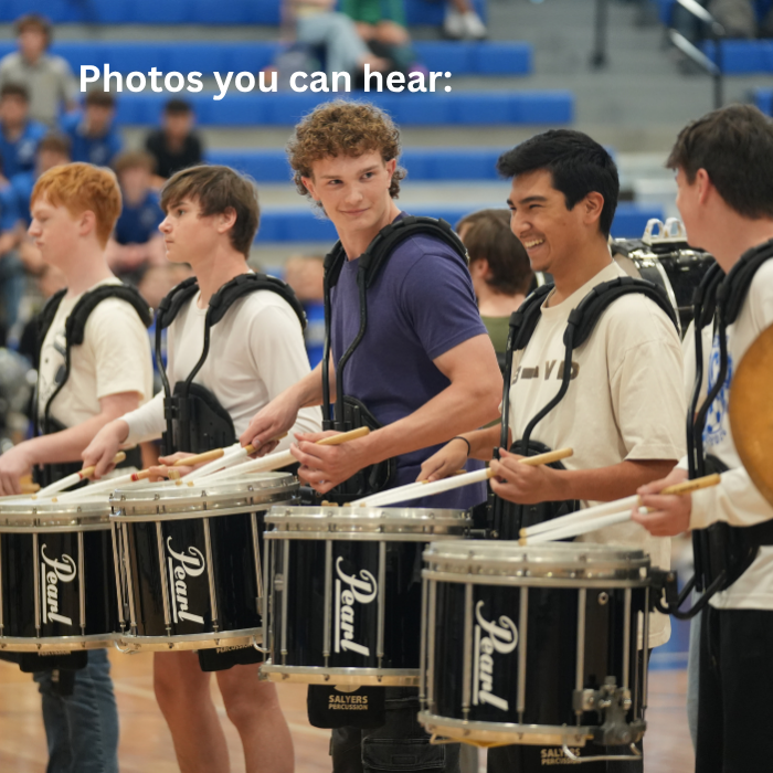 drumline playing and smiling