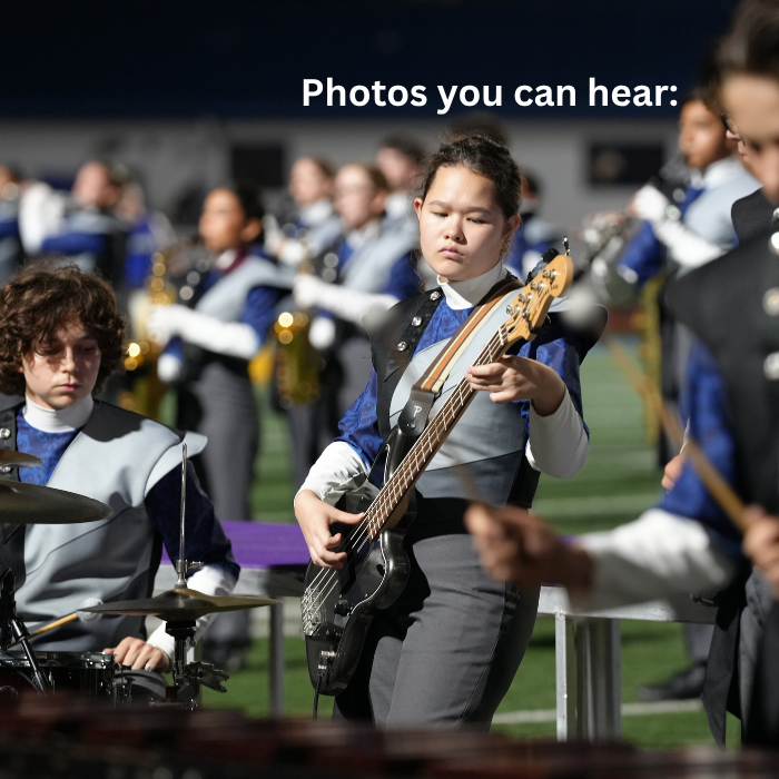 band member playing electric guitar