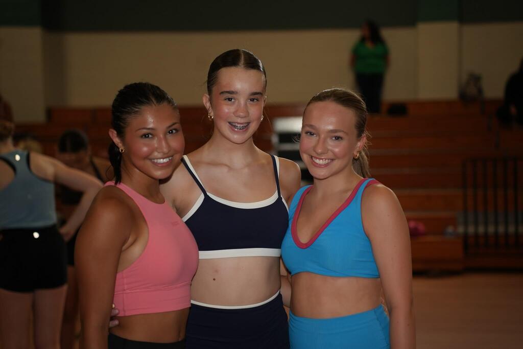 dancers smiling for camera