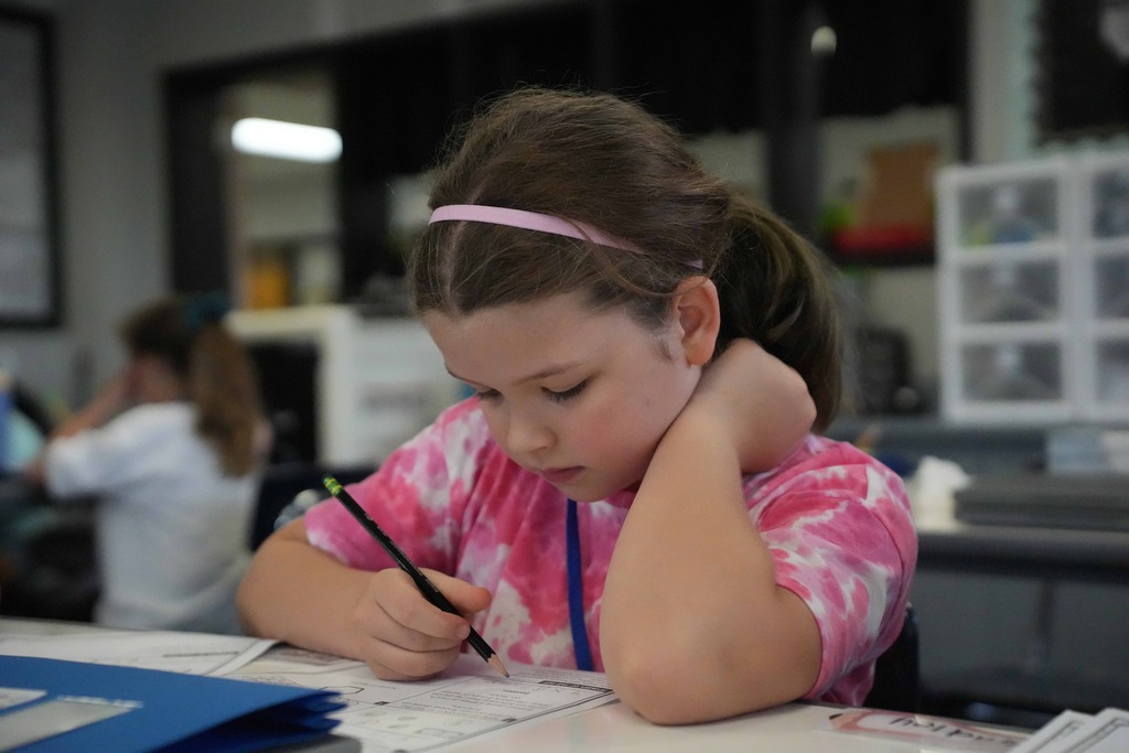 Girl working on worksheet
