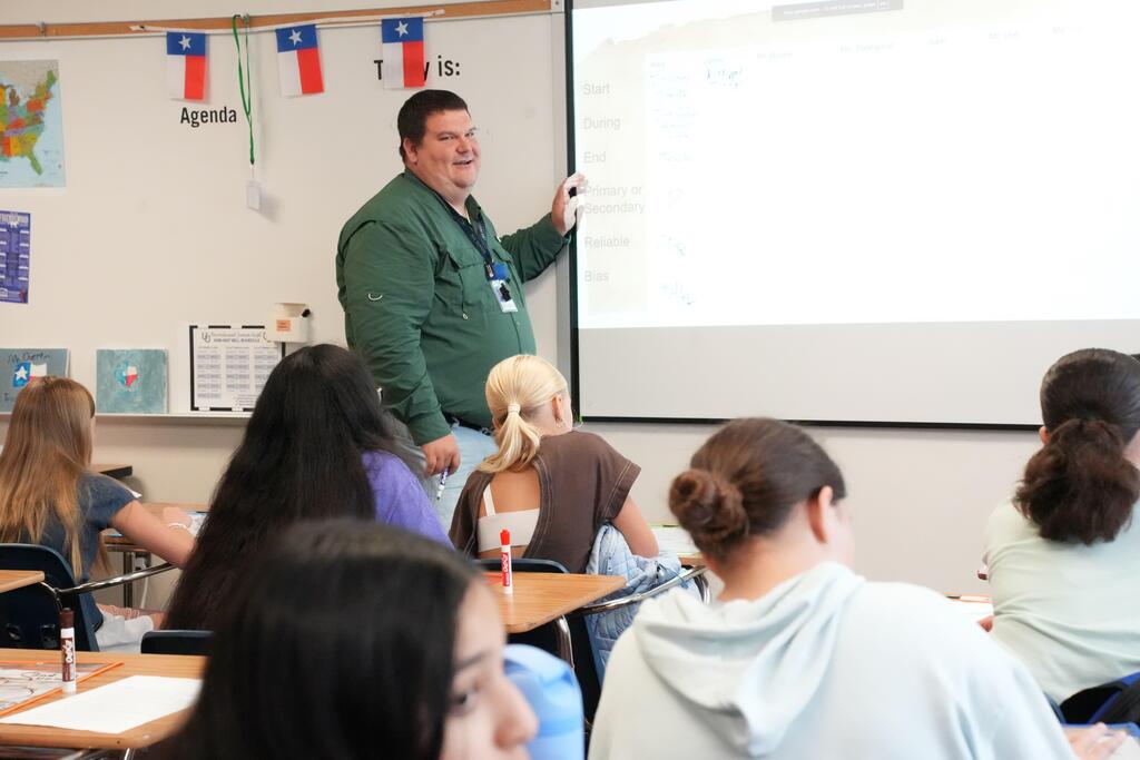 teacher at the white board 
