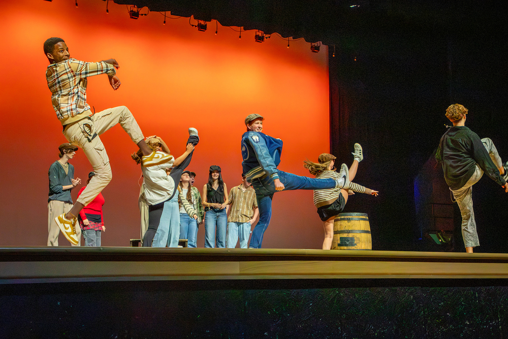 Theater students dancing and performing