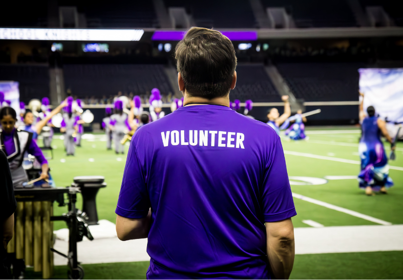 Man wearing volunteer shirt