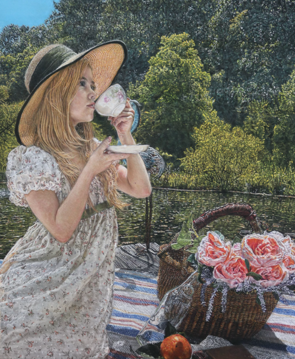 Girl sipping from a teacup in a garden