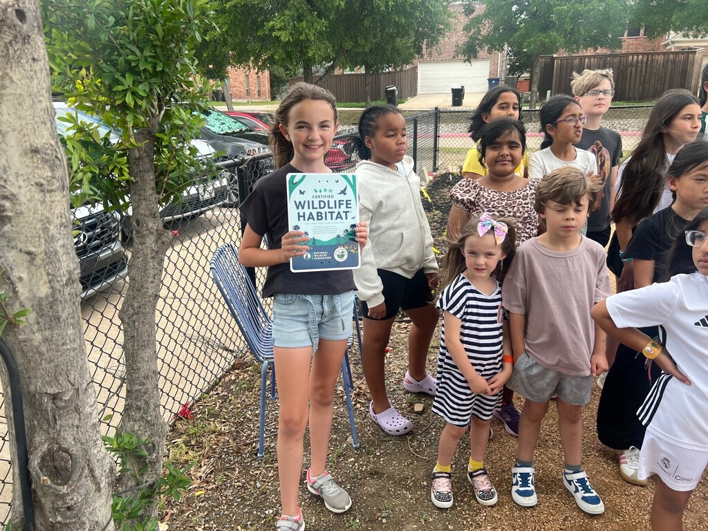 Students are excited to attend the garden ribbon-cutting.
