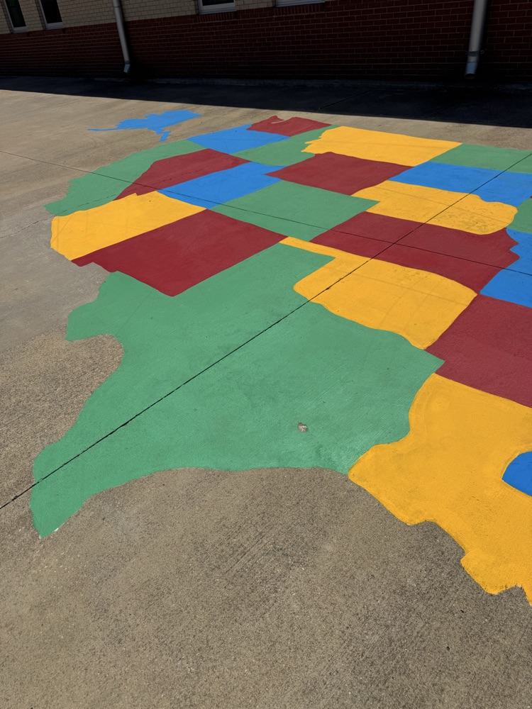 showcase Curtsinger Elementary’s updated recess areas, including colorful activity courts, basketball goals, and a painted Buddy Bench made possible through the support of Curtsinger PTA families.