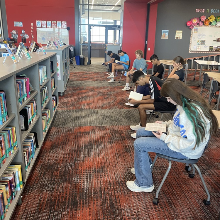 7th and 8th grade students visited the library to find new books by playing musical chairs. 