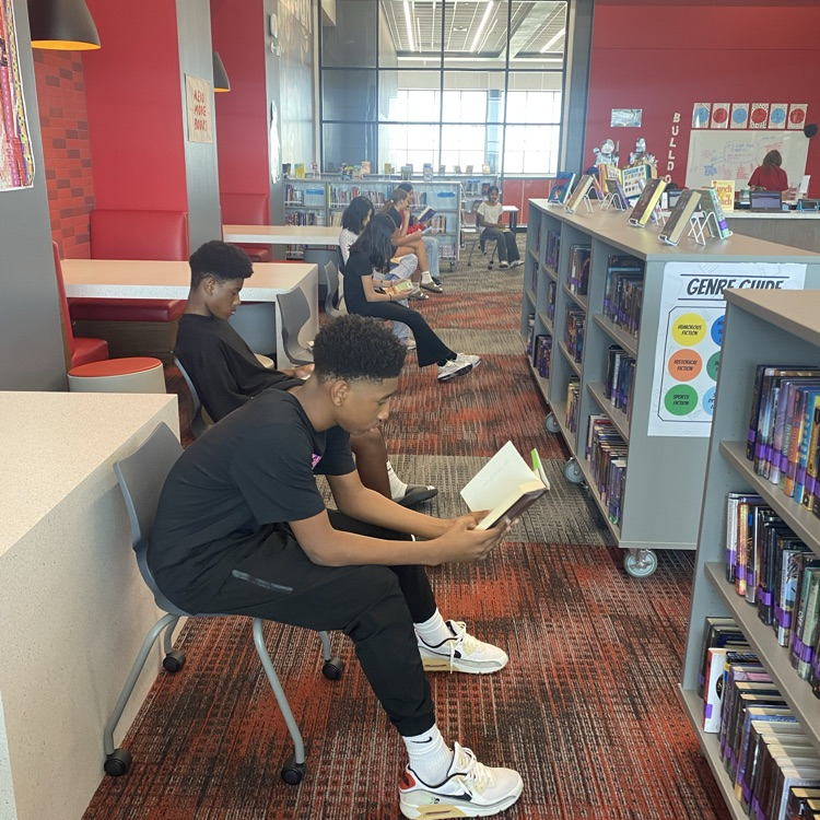 7th and 8th grade students visited the library to find new books by playing musical chairs. 