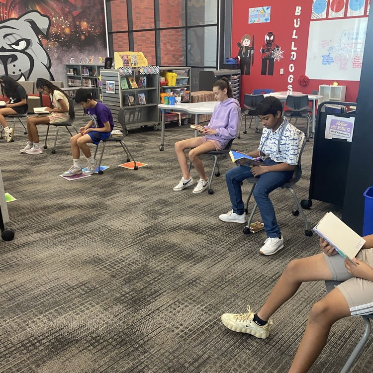 7th and 8th grade students visited the library to find new books by playing musical chairs. 