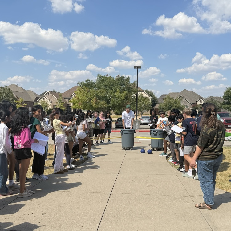 middle school science students learning outside