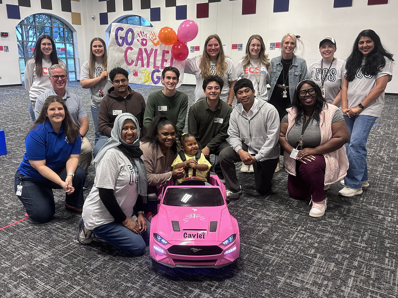 Caylei and the FISD staff and students who supported this project and Caylei, joined by mom Jada