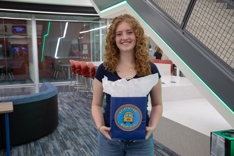 Kylie Gore, the winner of the bus wrap design contest