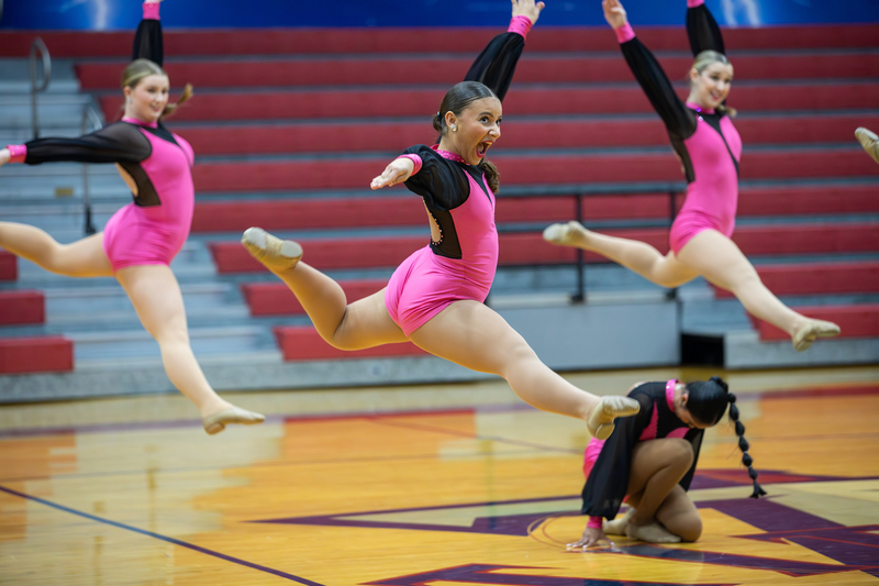 Dance team in pink performs at FISD Dance Showoffs