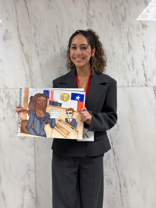 A student with her courtroom artwork