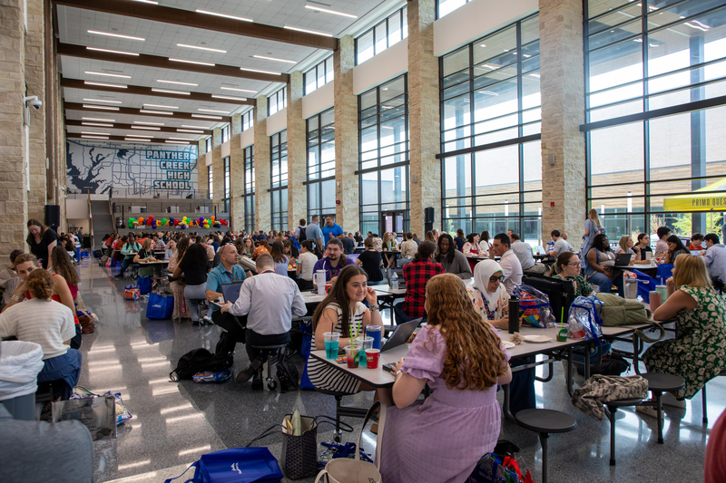 Staff gathered in the Panther Creek cafeteria