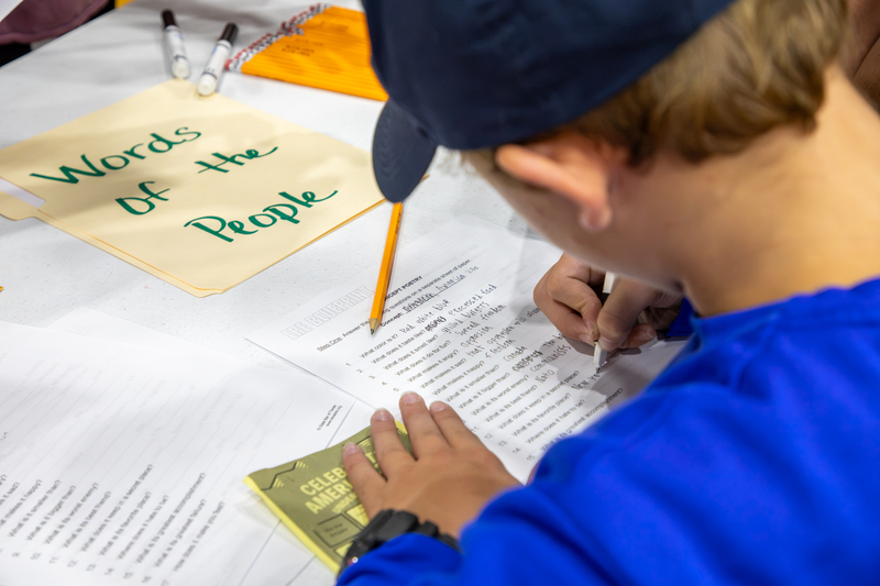 A student completes an activity at Centennial's America 250.
