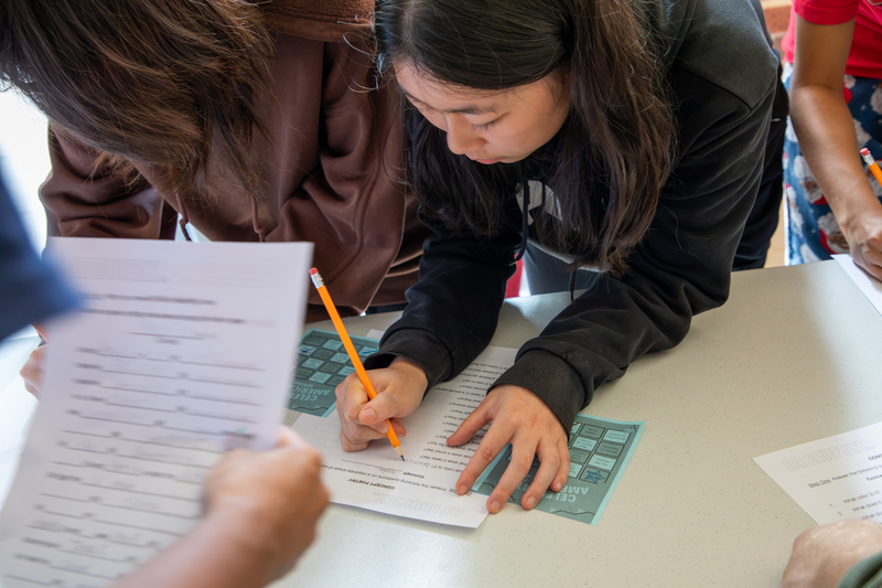 A student completes an activity at Centennial's America 250.