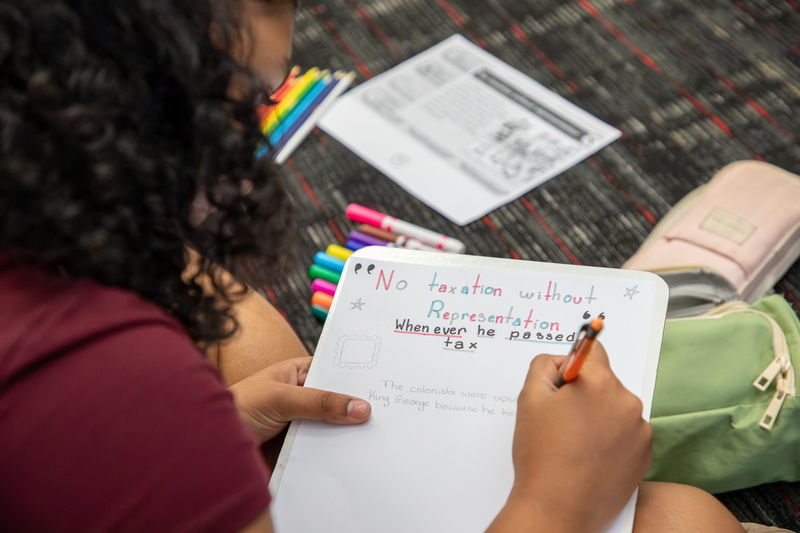 Wester students work on their posters.